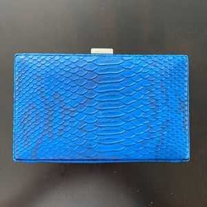 Blue reptile skin clutch